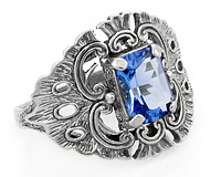 Широкое серебряное кольцо с перунитом Герб