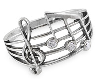 Серебряное кольцо с музыкальными нотами